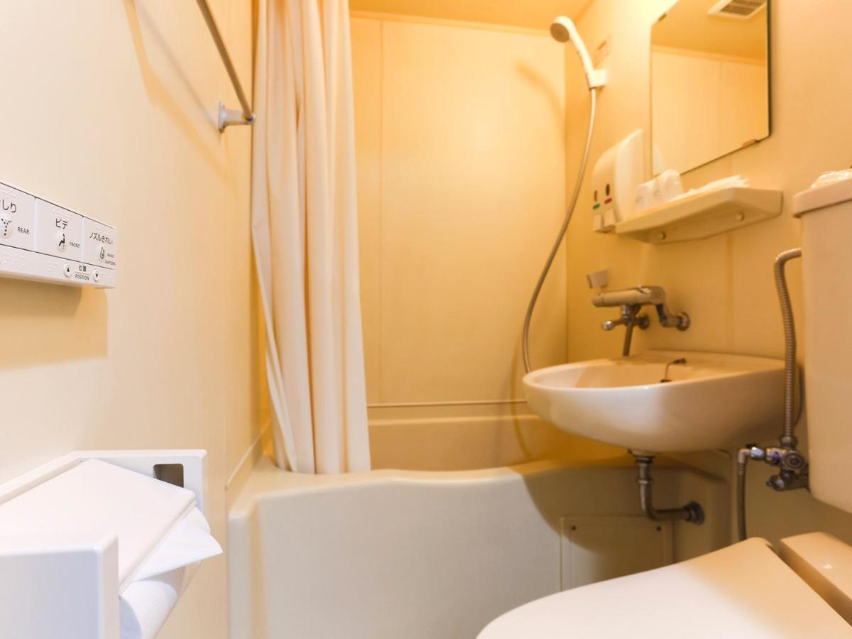 Business Hotel Sunpalace Токио Экстерьер фото