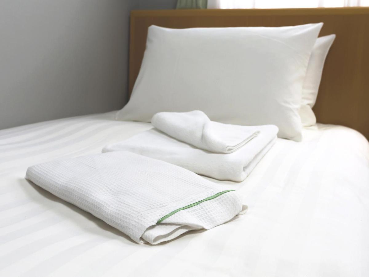 Business Hotel Sunpalace Токио Экстерьер фото