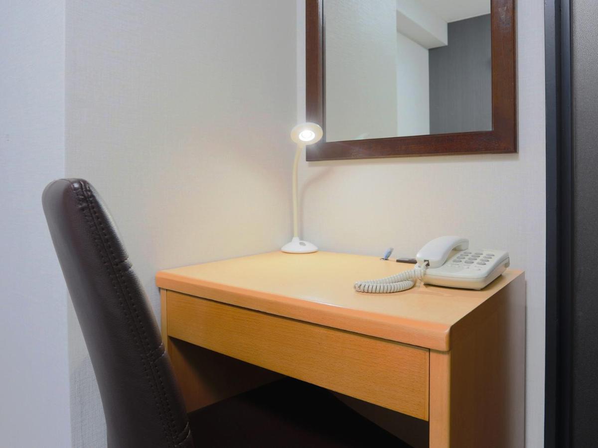 Business Hotel Sunpalace Токио Экстерьер фото