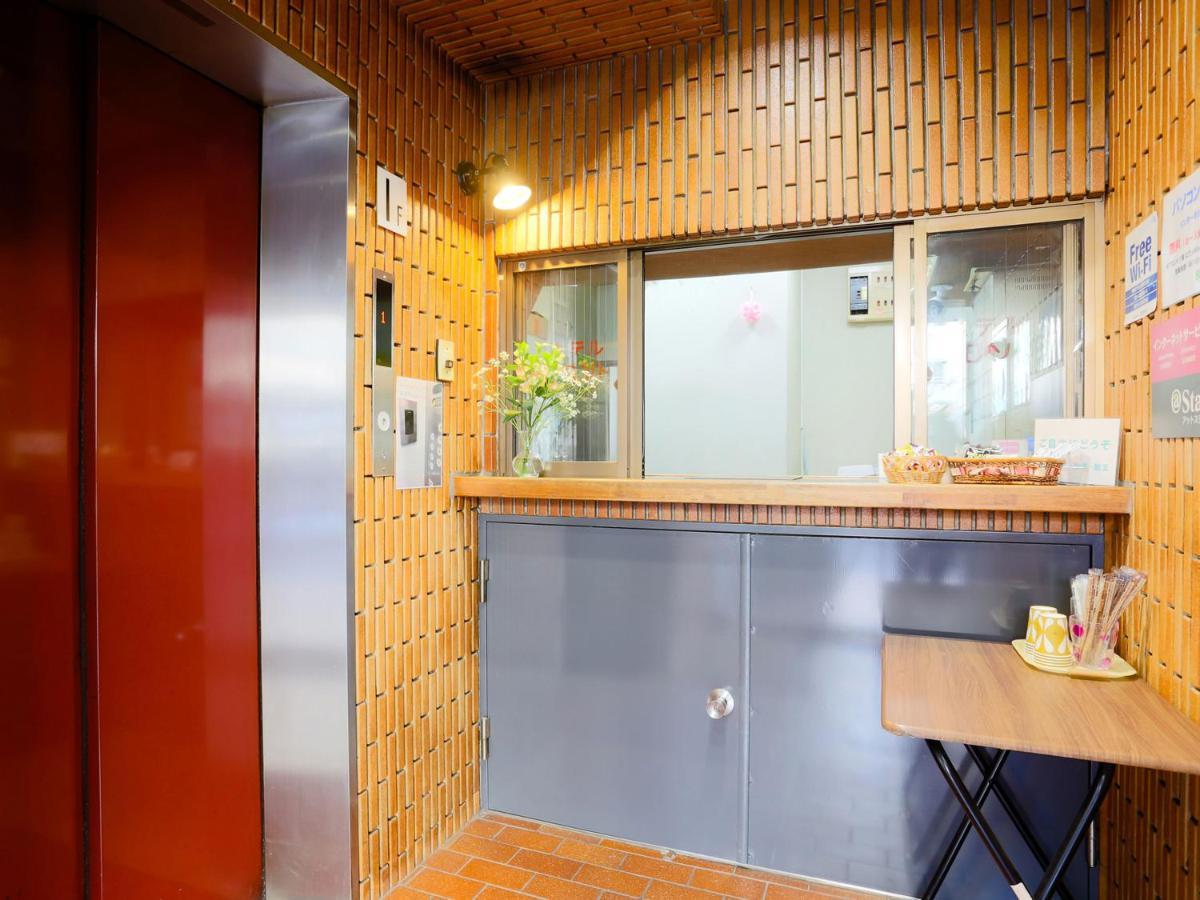 Business Hotel Sunpalace Токио Экстерьер фото