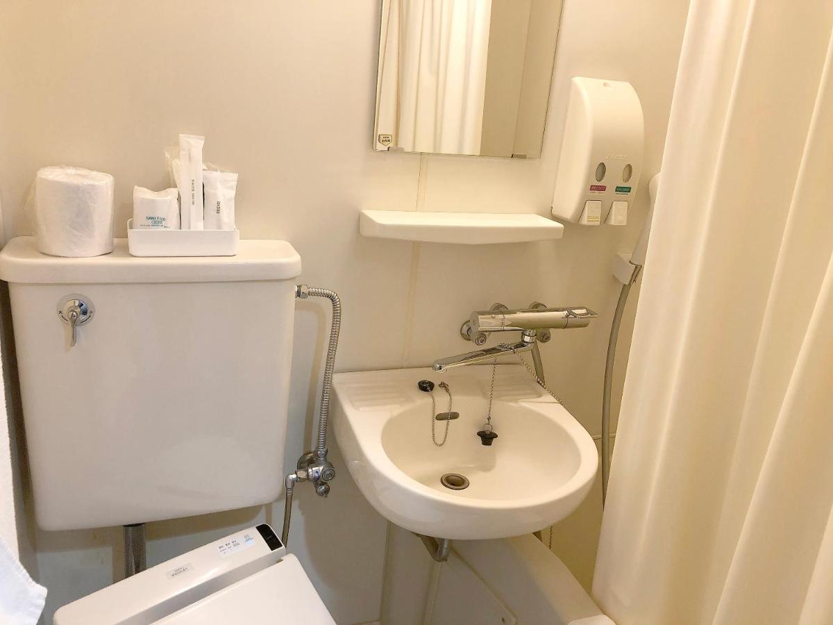 Business Hotel Sunpalace Токио Экстерьер фото